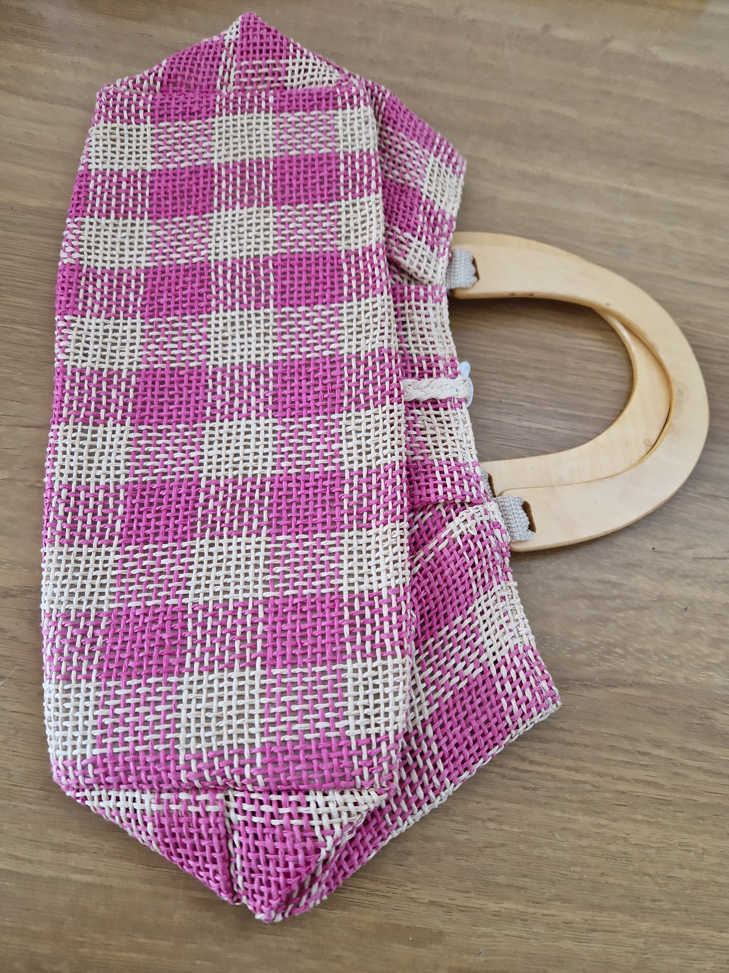 Woven pink and cream top handle bag