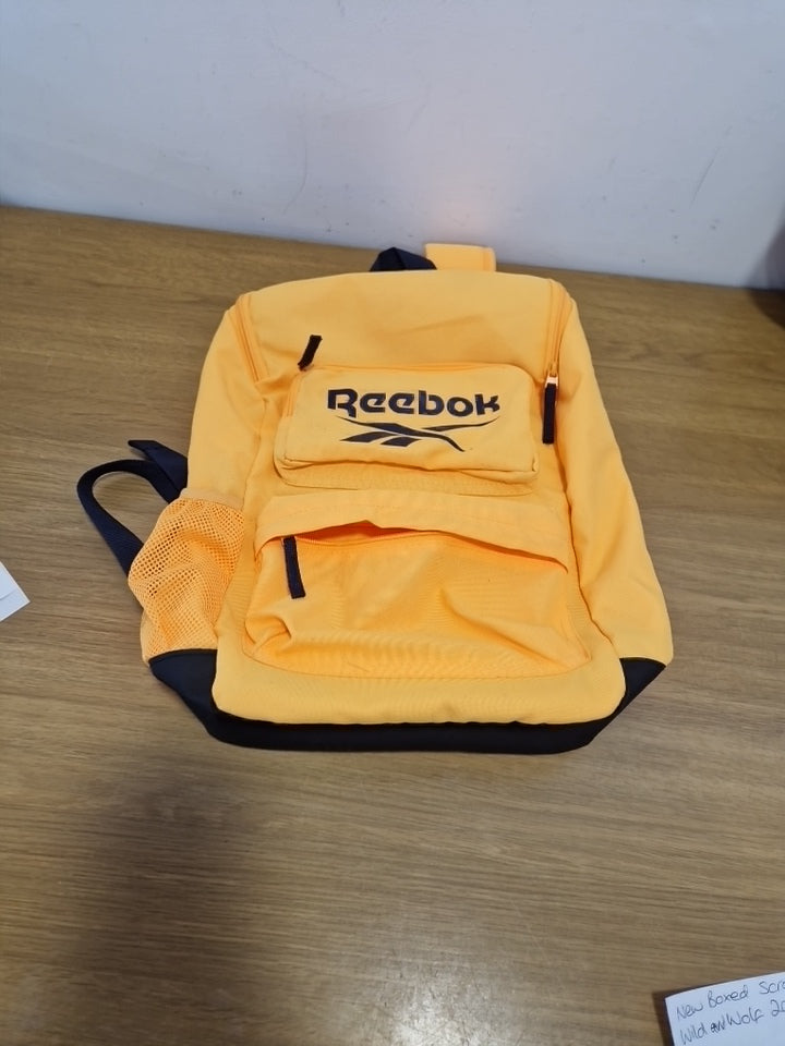 Yellow Reebok backpack with Ajustable Straps made with recycled materials