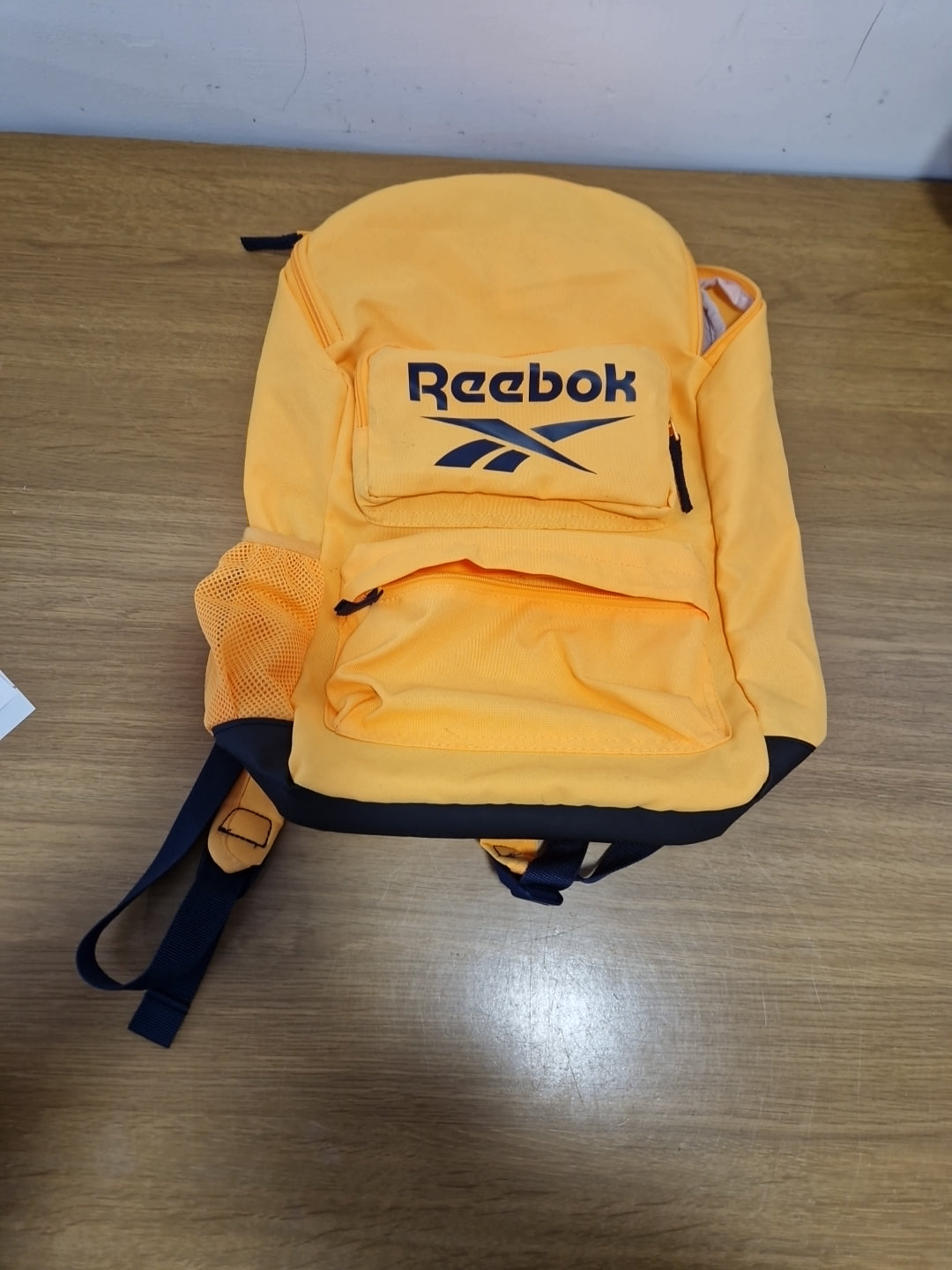 Yellow Reebok backpack with Ajustable Straps made with recycled materials