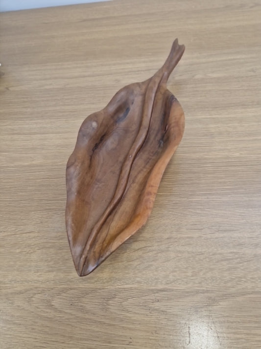 Wooden bowl in the shape of a leaf