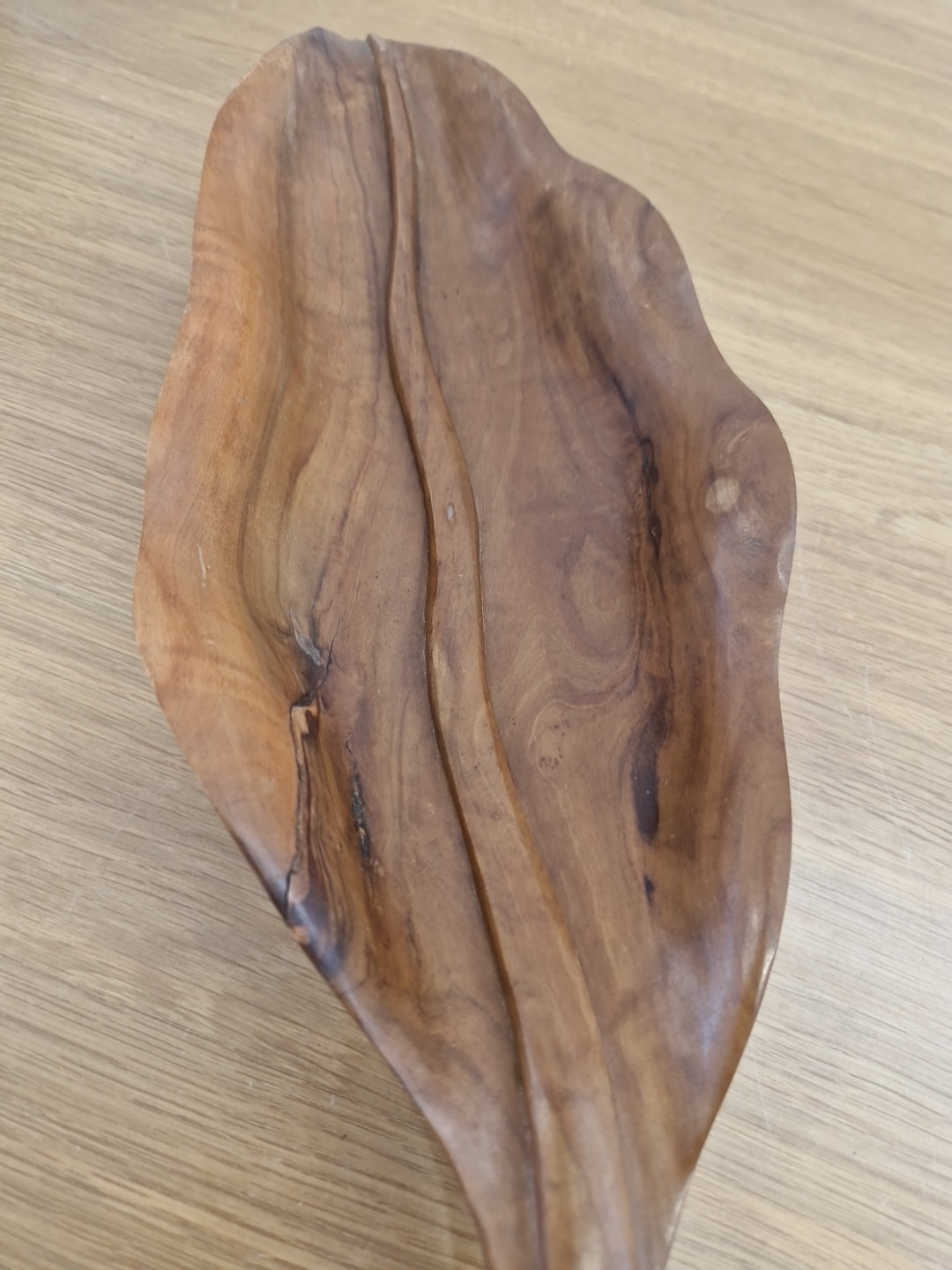 Wooden bowl in the shape of a leaf