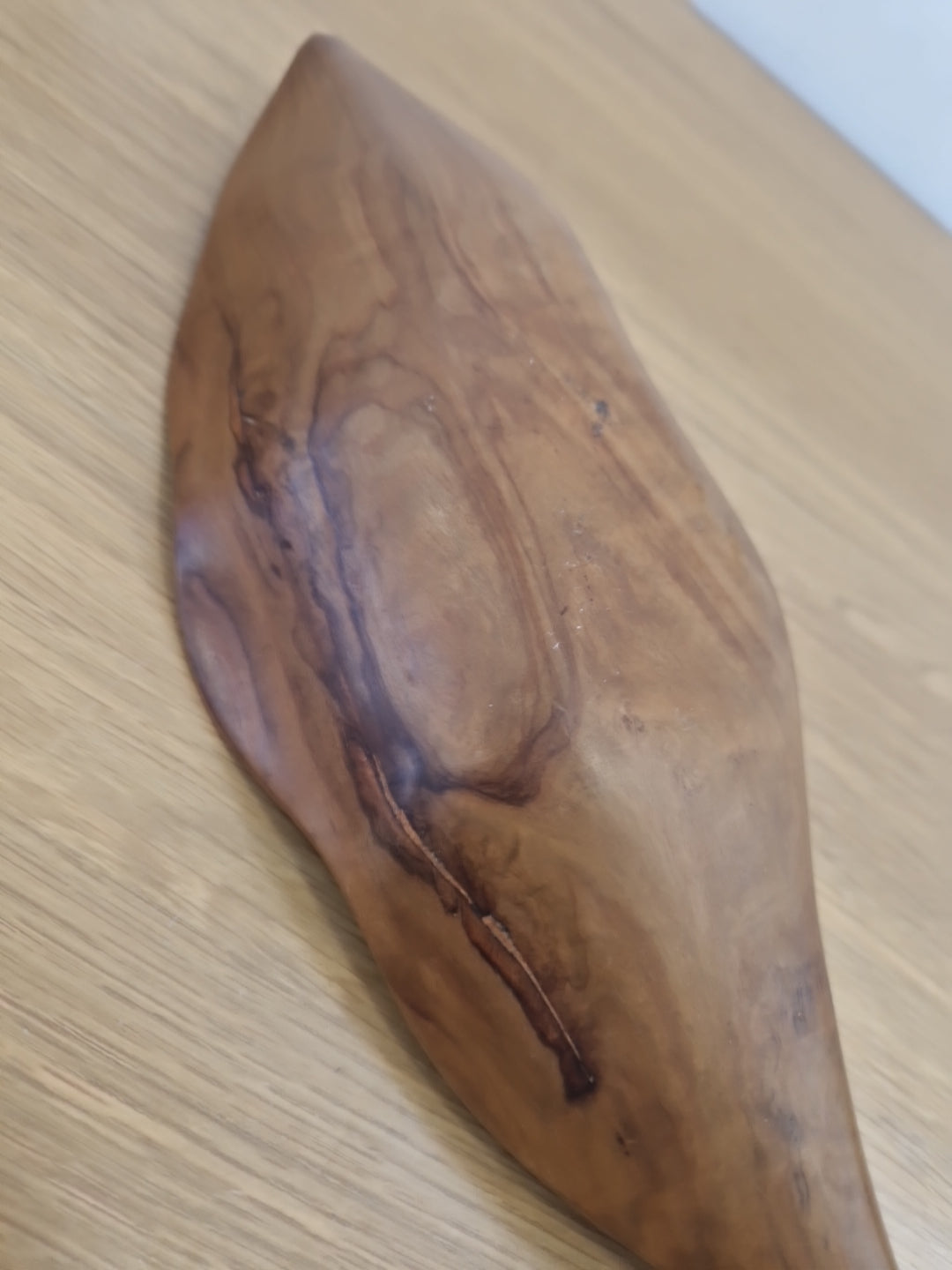 Wooden bowl in the shape of a leaf